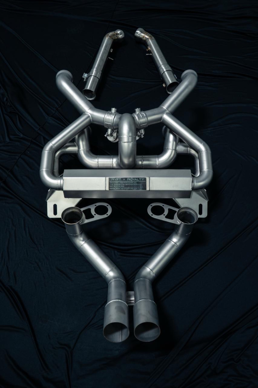 Complete Royalty Exhaust system top-down view: headers, mid-pipes, muffler with RYFT x Royalty plate, and dual tips for Lamborghini Murciélago