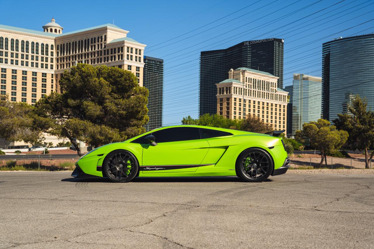 2011 Lamborghini Gallardo Superleggera in Verde Ithaca, side profile with Bellagio backdrop, Las Vegas