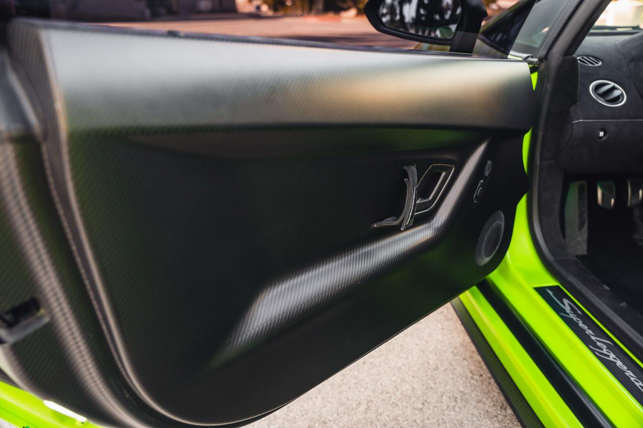 Carbon fiber door panel interior detail in the Gallardo Superleggera